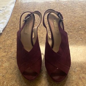 Women’s designer suede open toe, sling back pumps by Prada.